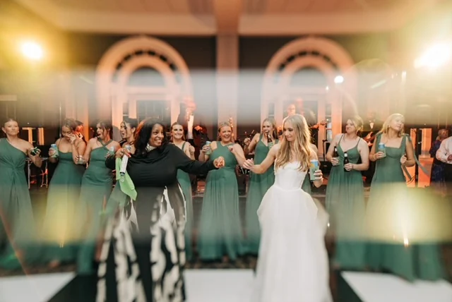 Encore of Lexington's vocalist with the bride and bridal party on the dance floor